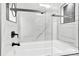 Modern bathroom with a walk-in shower and bathtub at 533 Amon Ln, Pineville, NC 28134