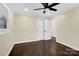 Bright bedroom with hardwood floors and double doors at 533 Amon Ln, Pineville, NC 28134