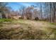 Large backyard behind the brick ranch house at 1095 Mount Ulla Hwy, Mooresville, NC 28115