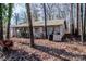 Block building with vines and various storage items at 1095 Mount Ulla Hwy, Mooresville, NC 28115
