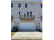 Townhouse rear view, showcasing private balcony and attached garage at 4225 S New Hope Rd # 9, Cramerton, NC 28032