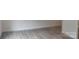 Empty bedroom with light gray walls and wood-look flooring at 4225 S New Hope Rd # 9, Cramerton, NC 28032