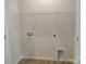Laundry room with hookups and shelving at 4225 S New Hope Rd # 9, Cramerton, NC 28032