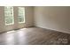 Spacious bedroom with hardwood floors and large windows at 4223 S New Hope Rd # 8, Cramerton, NC 28032