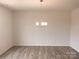 Bright dining room with hardwood floors and chandelier at 4223 S New Hope Rd # 8, Cramerton, NC 28032