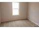 Simple bedroom with neutral wall and carpet at 4223 S New Hope Rd # 8, Cramerton, NC 28032