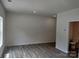 Spacious bedroom with wood-look flooring and ensuite bath at 4223 S New Hope Rd # 8, Cramerton, NC 28032