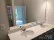 Double vanity bathroom with modern fixtures at 4223 S New Hope Rd # 8, Cramerton, NC 28032
