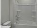 Clean bathroom with a shower/tub combo and built-in shelving at 4229 S New Hope Rd # 11, Cramerton, NC 28032