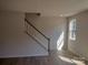 Elegant staircase with white railing and hardwood floors at 4229 S New Hope Rd # 11, Cramerton, NC 28032