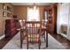 Formal dining room with wood table and hutch at 1003 Athenian Dr, Gastonia, NC 28052