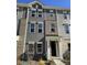 Three story home with gray siding and brick accents at 4227 S New Hope Rd # 10, Cramerton, NC 28032