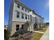Front view of townhouses with landscaping at 4227 S New Hope Rd # 10, Cramerton, NC 28032