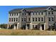 Three-story townhouses with brick and siding at 4227 S New Hope Rd # 10, Cramerton, NC 28032