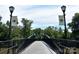 Scenic footbridge with welcome banners at 4227 S New Hope Rd # 10, Cramerton, NC 28032