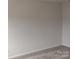 Simple bedroom with neutral walls and carpeted floors at 4227 S New Hope Rd # 10, Cramerton, NC 28032
