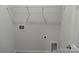 Laundry room with built-in shelving for storage at 4227 S New Hope Rd # 10, Cramerton, NC 28032