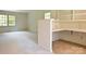 Bright office space with built-in desk and shelving at 165 Clearview Point Dr, Mount Gilead, NC 27306