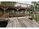 Covered boat dock with plenty of space for multiple boats and water toys at 165 Clearview Point Dr, Mount Gilead, NC 27306