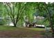 Private lake access with a wooden deck and stairs leading to the water at 165 Clearview Point Dr, Mount Gilead, NC 27306