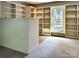 Spacious library with built-in shelving and large window at 165 Clearview Point Dr, Mount Gilead, NC 27306