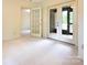 Bedroom with access to deck and view into another room at 165 Clearview Point Dr, Mount Gilead, NC 27306
