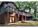 Brick house with two-story deck, offering ample outdoor space at 165 Clearview Point Dr, Mount Gilead, NC 27306