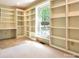 Bright office space with built-in shelving and large window at 165 Clearview Point Dr, Mount Gilead, NC 27306