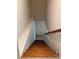 Wooden staircase with white railing at 165 Clearview Point Dr, Mount Gilead, NC 27306