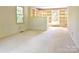 Simple bedroom with carpet and large windows at 165 Clearview Point Dr, Mount Gilead, NC 27306