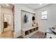 Organized laundry room with built-in bench and hooks at Lot 22 Devonshire Rd # 22, Denver, NC 28037