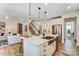 Open concept kitchen with island, stainless steel appliances, and view of living area at Lot 22 Devonshire Rd # 22, Denver, NC 28037