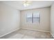 Bright bedroom with neutral walls, carpet, and ceiling fan at 494 Glory Ct, Fort Mill, SC 29715