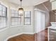 Bright breakfast nook with wood floors and window seating at 494 Glory Ct, Fort Mill, SC 29715