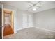 Bedroom with hardwood floors, double closets and access to hallway at 494 Glory Ct, Fort Mill, SC 29715