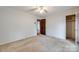 Well-lit bedroom with a large closet and neutral carpeting at 3811 Sherer Rd, Sharon, SC 29742