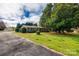 Ranch-style brick home with a large front yard and driveway at 3811 Sherer Rd, Sharon, SC 29742