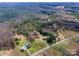 Aerial view showing home's location, a nearby road, and surrounding land at 3811 Sherer Rd, Sharon, SC 29742