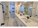 Modern bathroom with dual vanities and a large walk-in shower at 1017 North End Dr # 27, Charlotte, NC 28206
