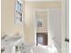 Clean bathroom with white subway tile and pedestal sink at 615 Peach St, Shelby, NC 28150