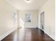 Bright bedroom with hardwood floors and access to bathroom at 615 Peach St, Shelby, NC 28150