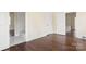 Bedroom with hardwood floors and adjacent bathroom at 615 Peach St, Shelby, NC 28150