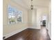 Charming breakfast room with hardwood floors and kitchen access at 615 Peach St, Shelby, NC 28150