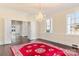 Elegant dining room with hardwood floors and chandelier at 615 Peach St, Shelby, NC 28150