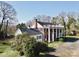 Two story brick home with a wrap around porch and detached garage at 615 Peach St, Shelby, NC 28150