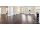 Spacious living room with hardwood floors and fireplace at 615 Peach St, Shelby, NC 28150