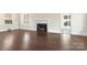 Living room with hardwood floors and fireplace at 615 Peach St, Shelby, NC 28150