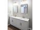 Double vanity bathroom with granite countertop and gold fixtures at 858 Mcclure Cir, Rock Hill, SC 29730