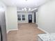 Open concept dining area with wood flooring and kitchen view at 858 Mcclure Cir, Rock Hill, SC 29730