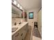 Bathroom with a shower/tub combo and updated vanity at 5419 Stevens Mill Rd, Matthews, NC 28104